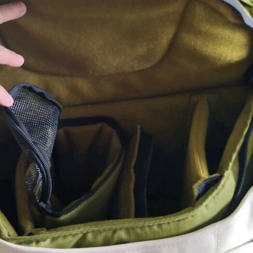 Crumpler professional photographer bag used with multiple compartments