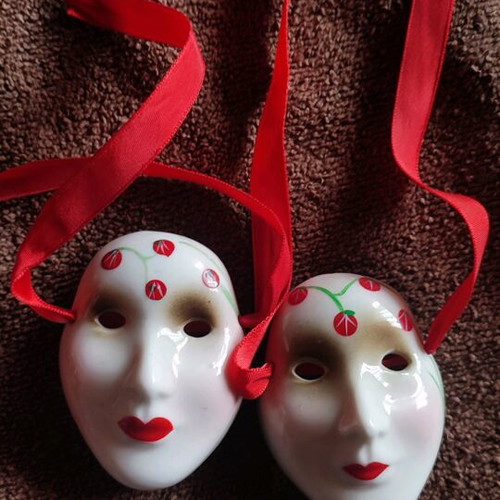 Small decorative masks like new, set of two