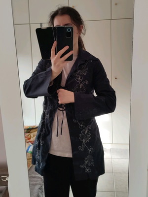 Black cardigan with embroidered designs like new, size 38