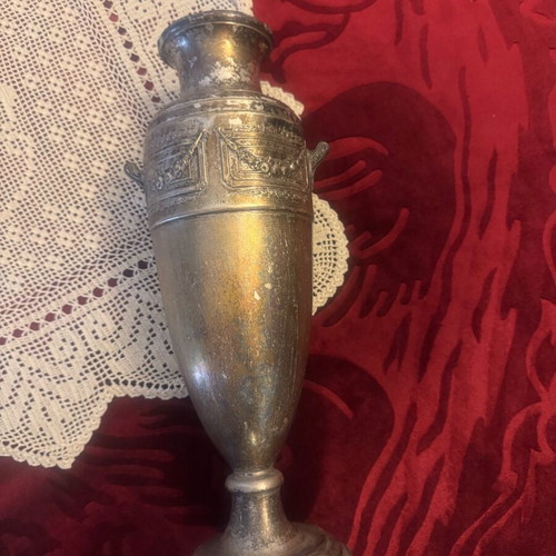 Large metal vase used, very old