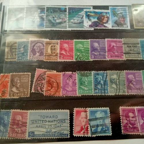 Stamp album with some stamps, mostly cancelled