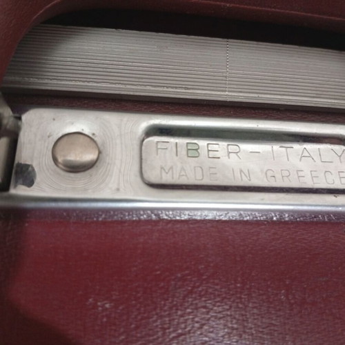 Vintage travel suitcase used, burgundy leather exterior