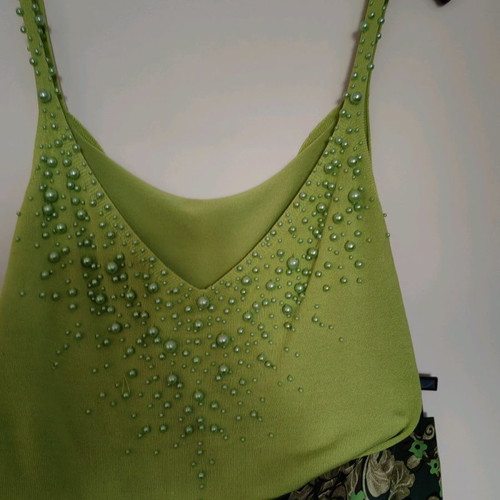 Knitted top used green lime with green pearls, size S
