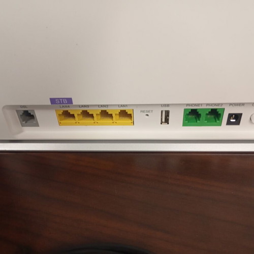 Cosmote hybrid access point with SIM card port