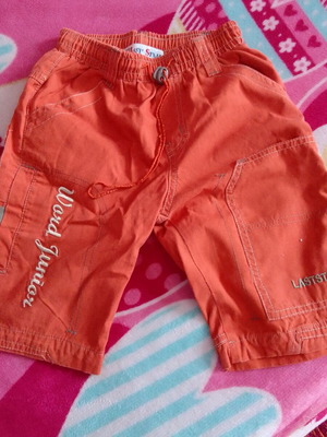 Orange bermuda shorts for boy 4 years like new, with pockets and elastic waist