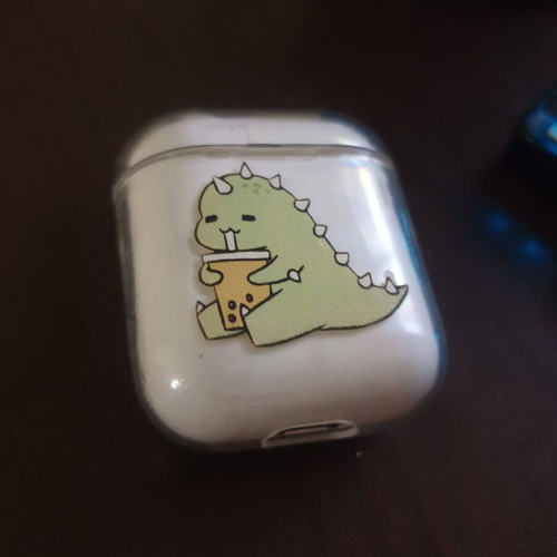 Transparent AirPods case like new with dinosaur design