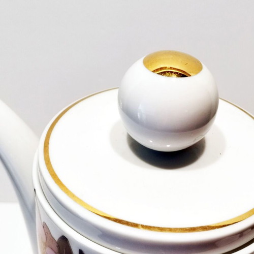 Vintage seventies porcelain teapot used with geometric design