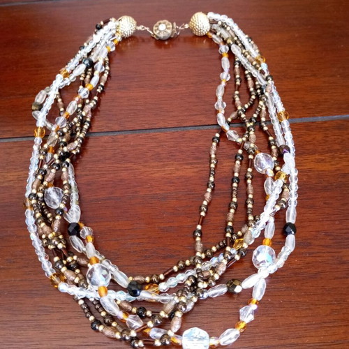 Necklace new with multiple strands