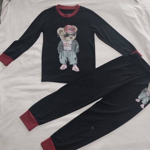 Pajama set size 7 years used, black and red