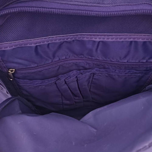 Backpack used, purple color