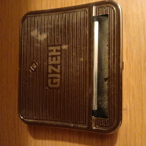 Rolling cigarette case used