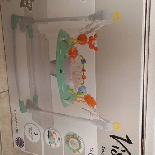 Jumberoo Moni like new with rotating seat and music