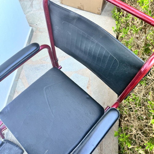Red toilet wheelchair like new, missing container