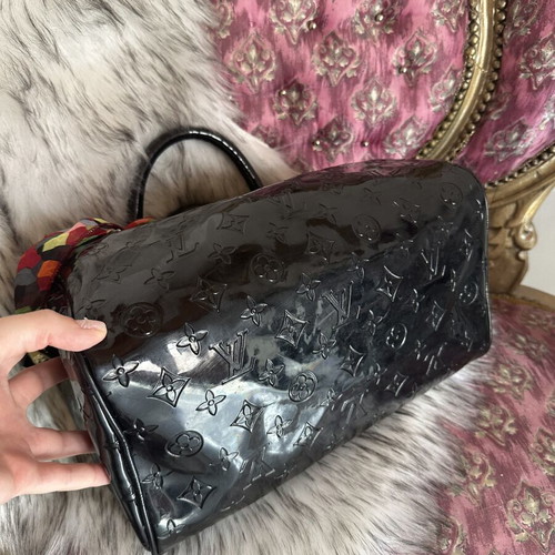 Louis Vuitton old black bag with gold accessories