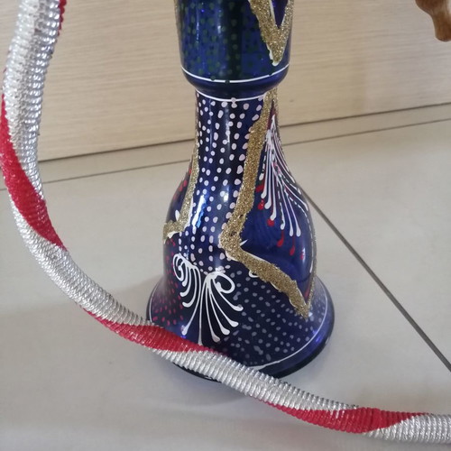 Oriental hookah used with stained glass bottle