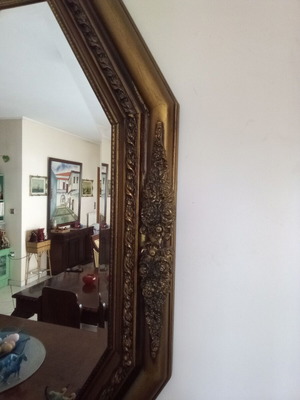 Carved mirror like new with intricate details
