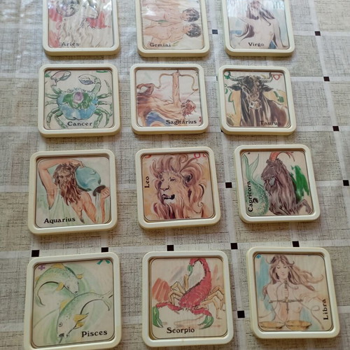 Vintage set of 12 plastic coasters - The 12 zodiac signs