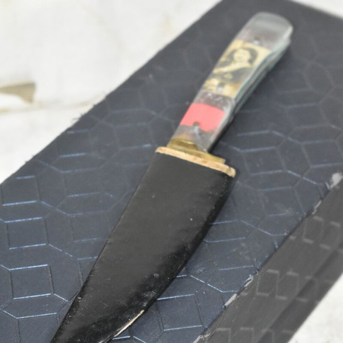 Traditional Cretan Knife with Mantinada and Decorative Handle used