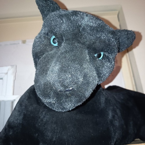 Large plush black panther with blue eyes, like new