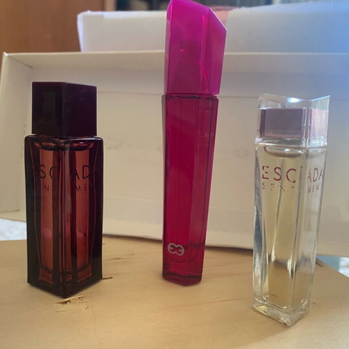 Escada miniatures like new, pack of 3 men's and women's
