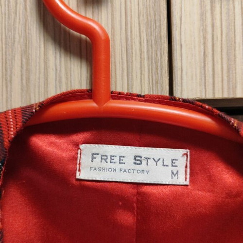 Vest used in winter plaid with red and cypress
