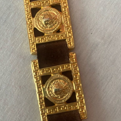 Belt with golden metal details on brown leather, like new