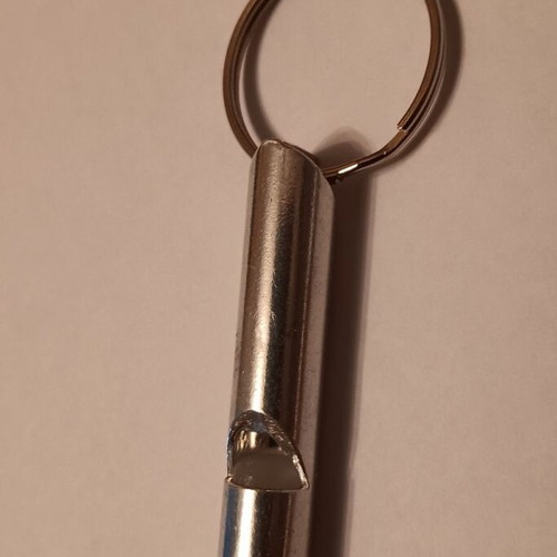 Set of 2 metal children's whistles with rings new