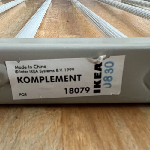 Komplement IKEA 18079 sliding metal wardrobe rack for pants organization
