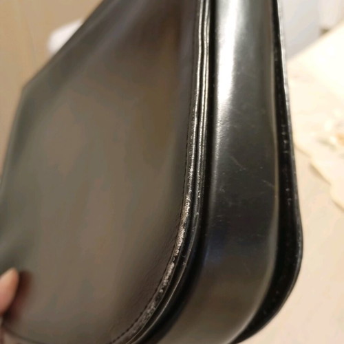 Black leather shoulder bag used with minimal wear