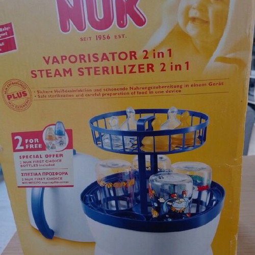 Nuk bottle and pacifier sterilizer used