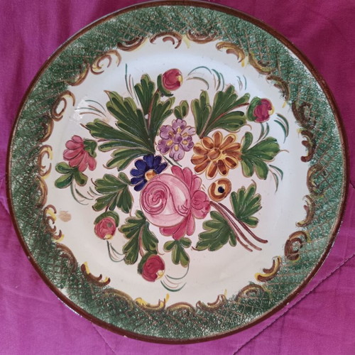 Decorative ceramic plate with hand-engraved floral motif, like new