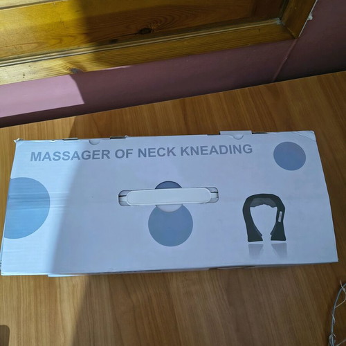 Neck massage device new in excellent condition