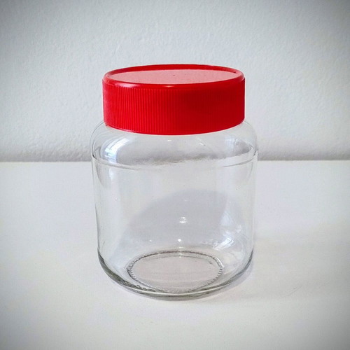 Set of 4 Glass Storage Jars with Plastic Lids like new
