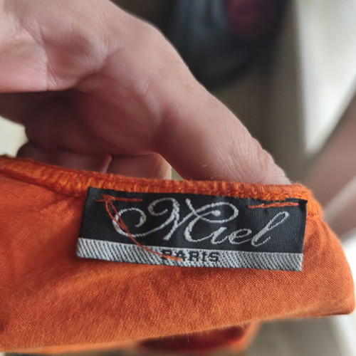 Orange blouse with embroidered beads, like new