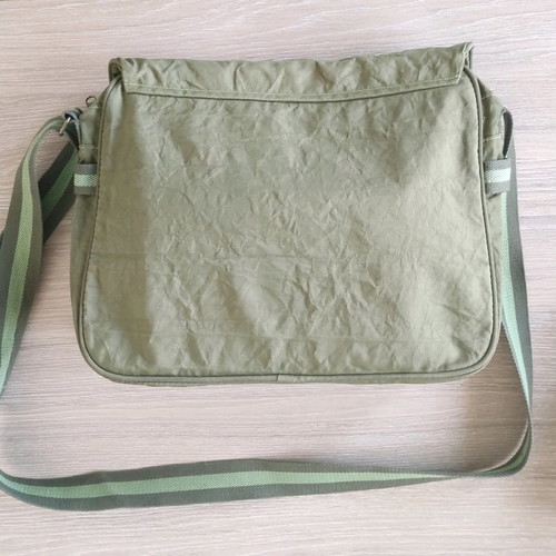 Sisley crossbody school bag used in green color