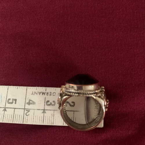 Vintage rings with green and burgundy stones like new