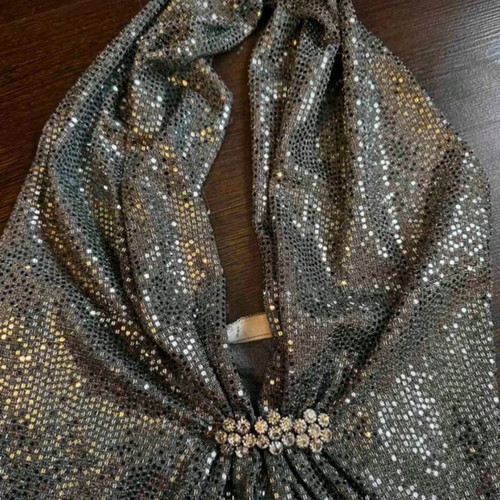 Festive dress silver like new with striking jewel and open back