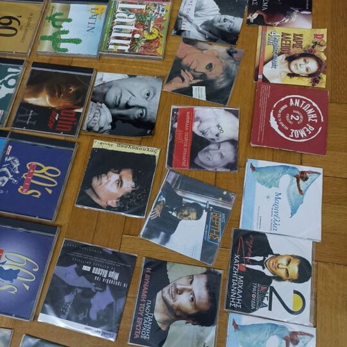 43 assorted DVDs with songs and movies