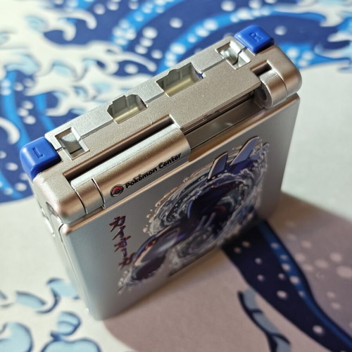 Silver Gameboy Advance SP shell with embossed Kyogre UV print