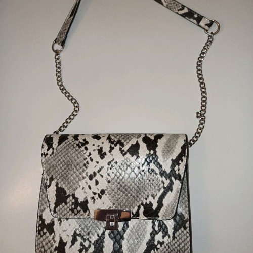 Zebre women's bag small like new with silver details