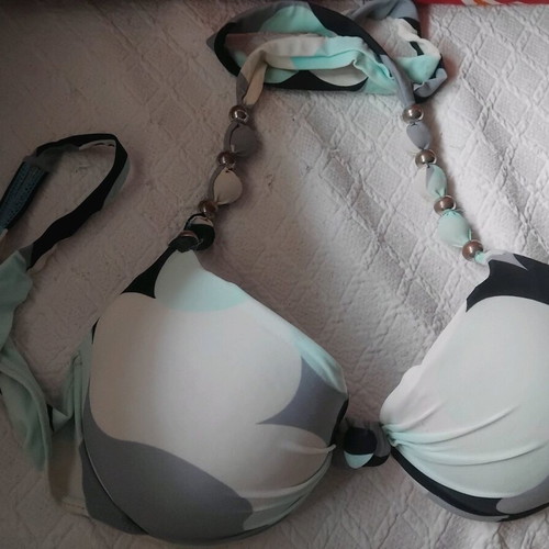 Swimsuit used in blue shades with padding and adjustable ties