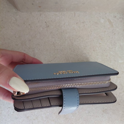 Kate Spade wallet new, turquoise with multiple card slots