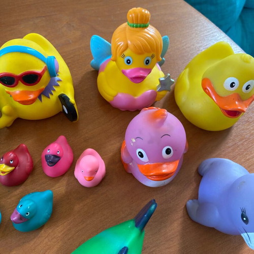 Collection of ducks and fish toys used for decoration and crafts