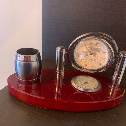 Desk decoration used with globe and pencil holder on wooden base