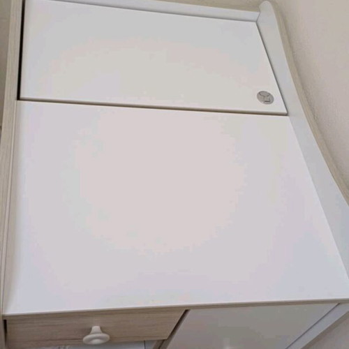 Baby crib like new with integrated changing table and storage space