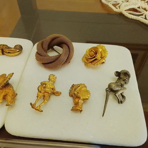 Vintage jewelry collection used, pins, brooches, and keychains