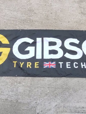 Banner Gibson tyres enduro 290x70 used for garage decoration