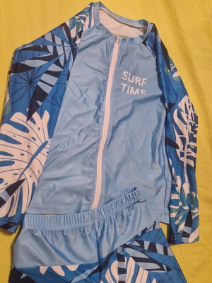 Sun-protective swimwear set with top and bottom, blue and white, size 134 cm