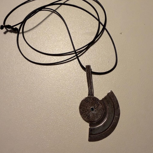 Handmade pendant like new with dark green stone and leather cord