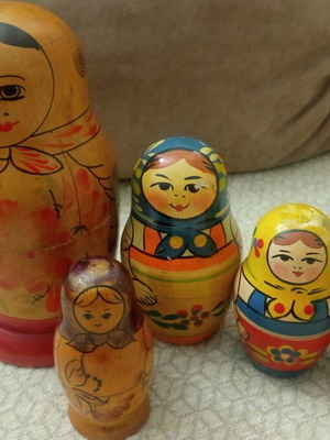 Wooden folk art figures set used, different babushkas